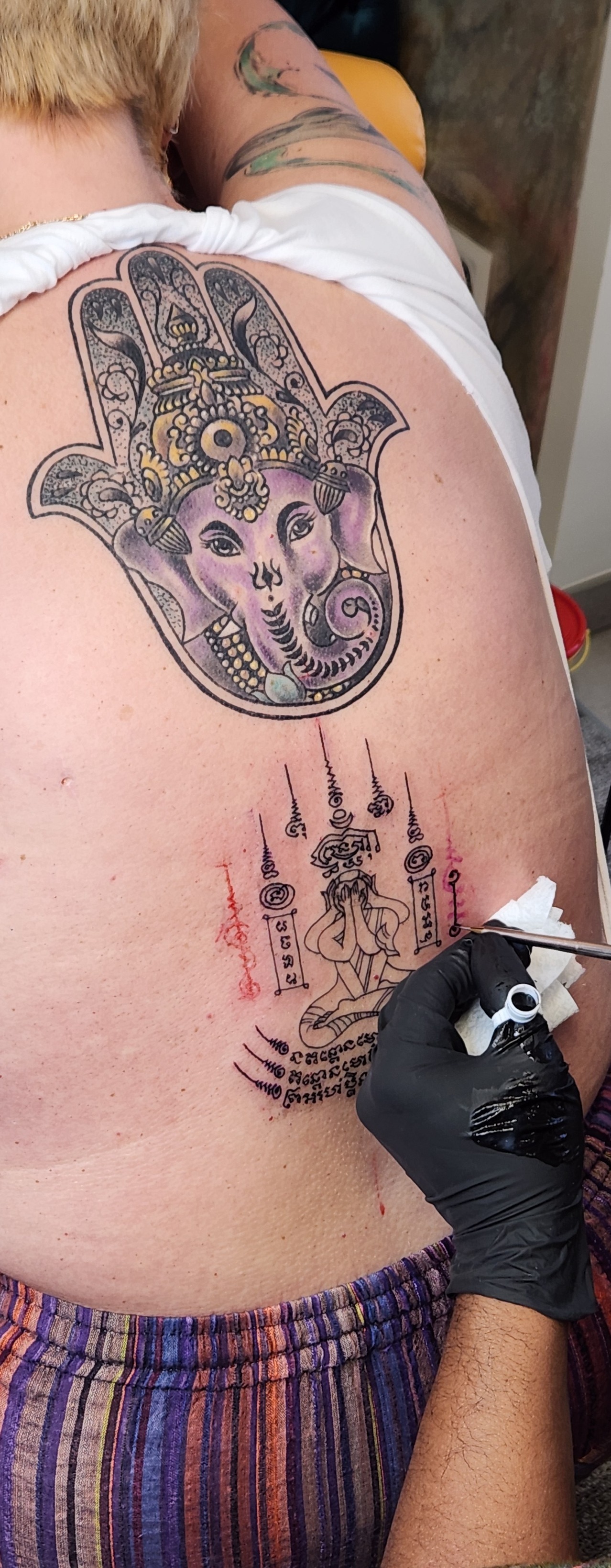 Pong Chaiya Sak Yant munkája a Pinker Tattoo galériából